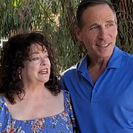 Wife and husband smiling