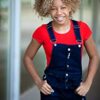 Timia Simone Reed Timia Simone Reed standing with hands in pockets for portfolio picture